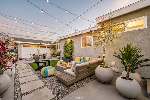 4852 W 129th St, Hawthorne, CA 90250 - view of patio featuring an outdoor living space with a fire pit
