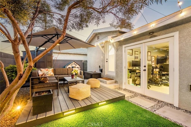 4852 W 129th St, Hawthorne, CA 90250 - wooden deck with outdoor lounge area, a fenced backyard, and french doors