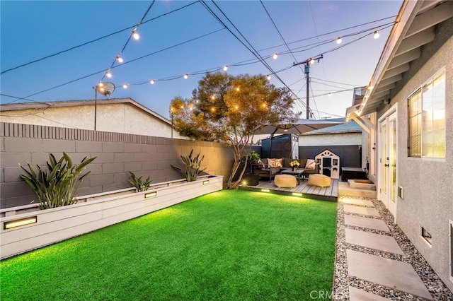 4852 W 129th St, Hawthorne, CA 90250 - fenced backyard featuring outdoor lounge area and a deck