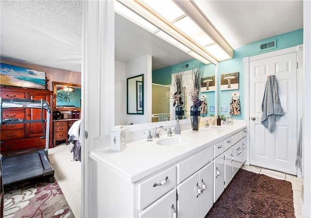 5471 E Centralia St Unit 24, Long Beach, CA 90808 - full bath with double vanity, ensuite bath, and tile patterned flooring