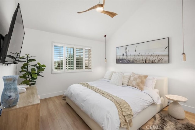 20092 Bayfront Ln Unit 206, Huntington Beach, CA 92646 - bedroom featuring baseboards, wood finished floors, lofted ceiling, and a ceiling fan