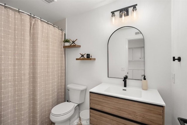 20092 Bayfront Ln Unit 206, Huntington Beach, CA 92646 - full bathroom with vanity, toilet, and a shower with shower curtain