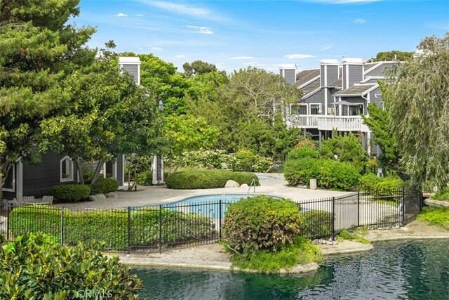 20092 Bayfront Ln Unit 206, Huntington Beach, CA 92646 - view of home's community with a swimming pool and a patio area