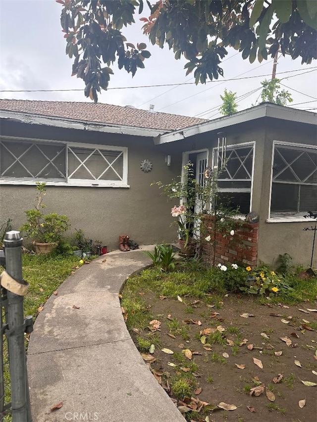 4574 La Madera Ave, El Monte, CA 91732 - doorway to property featuring stucco siding