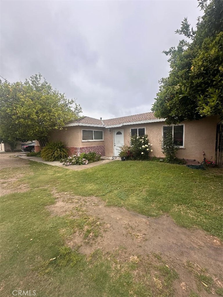 4574 La Madera Ave, El Monte, CA 91732 - ranch-style home featuring stucco siding, a front lawn, and brick siding