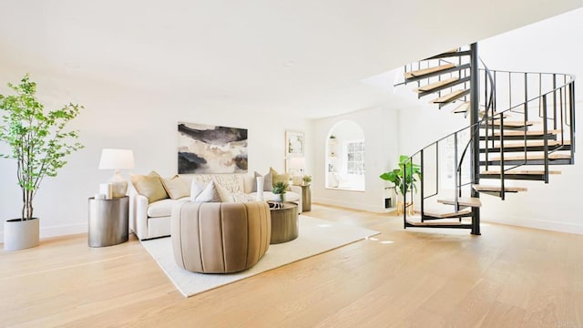3728 Wawona Dr, San Diego, CA 92107 - living room featuring wood finished floors, baseboards, and stairway