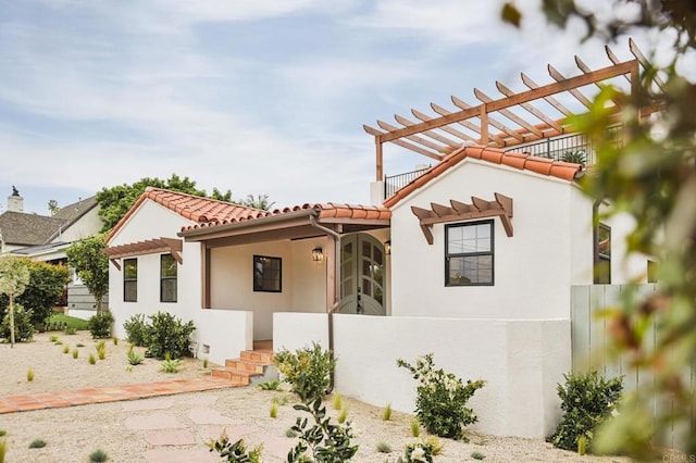 3728 Wawona Dr, San Diego, CA 92107 - view of front of property featuring a tiled roof, stucco siding, and a pergola
