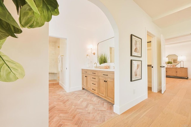 3728 Wawona Dr, San Diego, CA 92107 - hall featuring arched walkways and baseboards