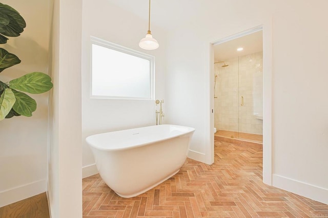 3728 Wawona Dr, San Diego, CA 92107 - bathroom featuring a stall shower, a freestanding bath, and baseboards