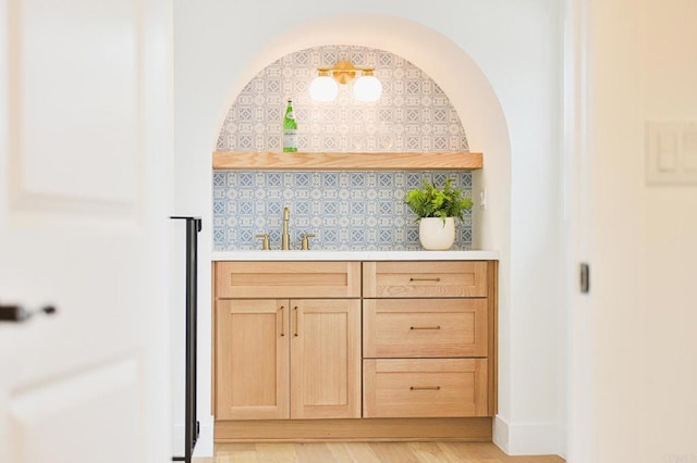 3728 Wawona Dr, San Diego, CA 92107 - bar area featuring a sink and tasteful backsplash