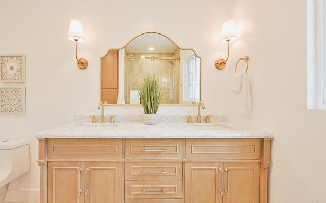 3728 Wawona Dr, San Diego, CA 92107 - bathroom featuring toilet, double vanity, and an enclosed shower
