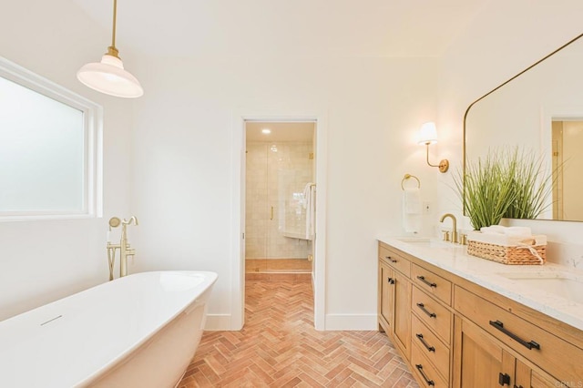 3728 Wawona Dr, San Diego, CA 92107 - full bathroom with double vanity, a freestanding tub, baseboards, brick flooring, and a shower stall