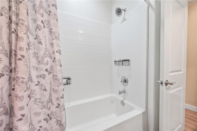 11437 Excelsior Dr Unit C, Norwalk, CA 90650 - full bathroom featuring shower / tub combo with curtain, wood finished floors, and baseboards