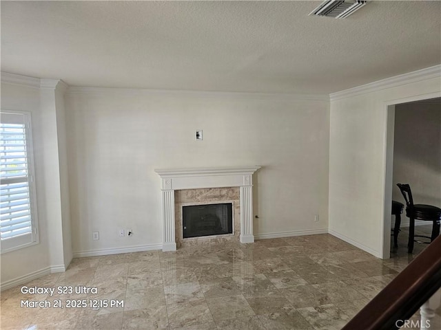 1849 10th Ave, Monrovia, CA 91016 - unfurnished living room with ornamental molding, a high end fireplace, a textured ceiling, and baseboards