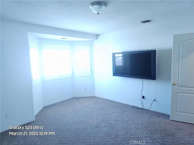 1849 10th Ave, Monrovia, CA 91016 - unfurnished living room with carpet, baseboards, and a textured ceiling
