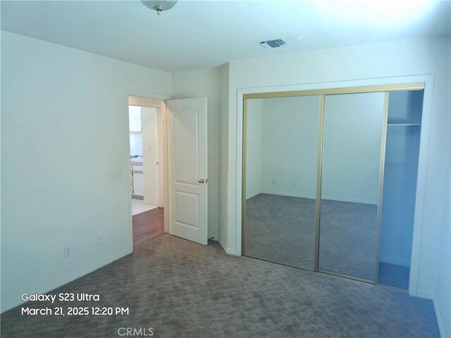 1849 10th Ave, Monrovia, CA 91016 - unfurnished bedroom with carpet, a closet, and baseboards
