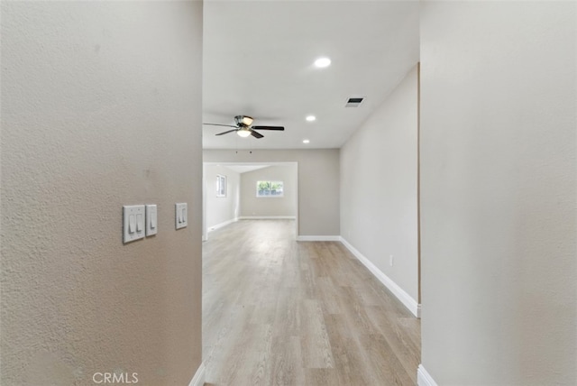 1551 Indian Trl, San Bernardino, CA 92407 - hallway with light wood-style flooring, baseboards, and recessed lighting