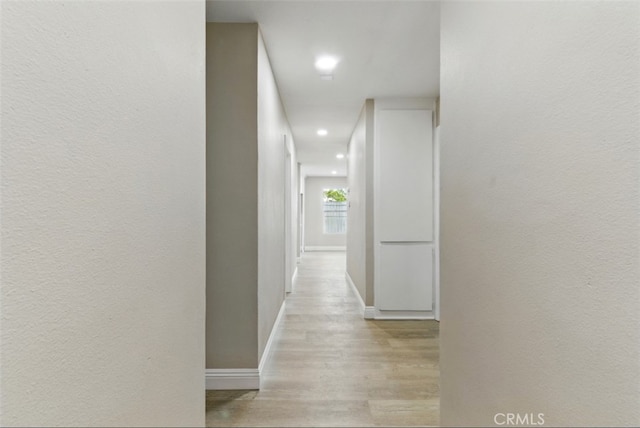 1551 Indian Trl, San Bernardino, CA 92407 - corridor featuring light wood-type flooring, recessed lighting, and baseboards