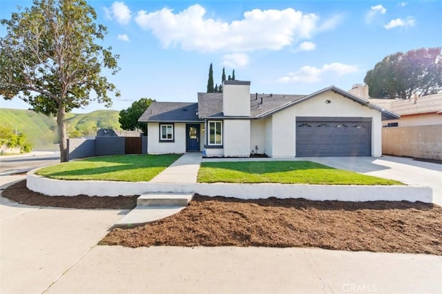 1551 Indian Trl, San Bernardino, CA 92407 - single story home with a garage, stucco siding, a chimney, and concrete driveway
