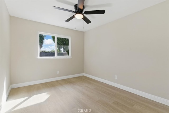 1551 Indian Trl, San Bernardino, CA 92407 - spare room featuring light wood-style flooring, baseboards, and a ceiling fan