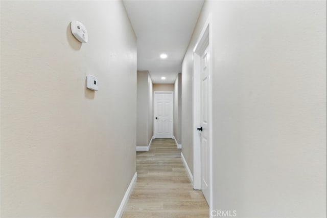 1551 Indian Trl, San Bernardino, CA 92407 - hallway featuring baseboards, light wood finished floors, and recessed lighting