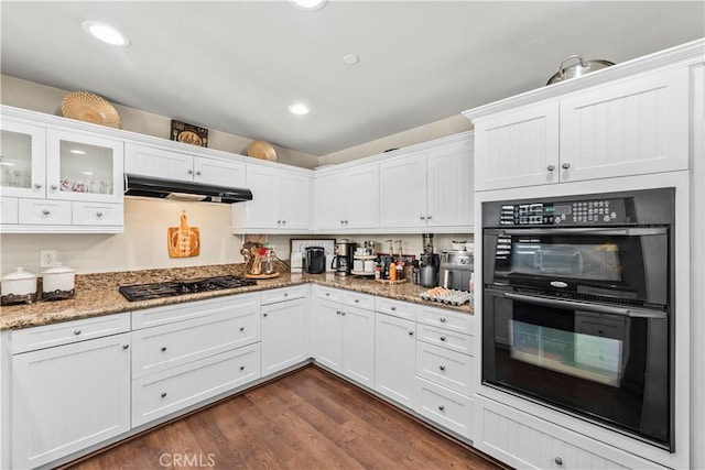 7925 Hemingway Ct, Fontana, CA 92336 - kitchen featuring black appliances, under cabinet range hood, white cabinets, light stone counters, and recessed lighting