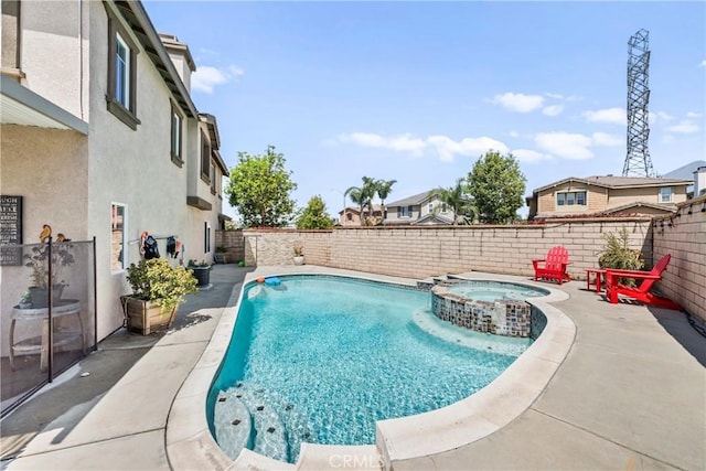 7925 Hemingway Ct, Fontana, CA 92336 - view of swimming pool with a fenced backyard, a pool with connected hot tub, and a patio area