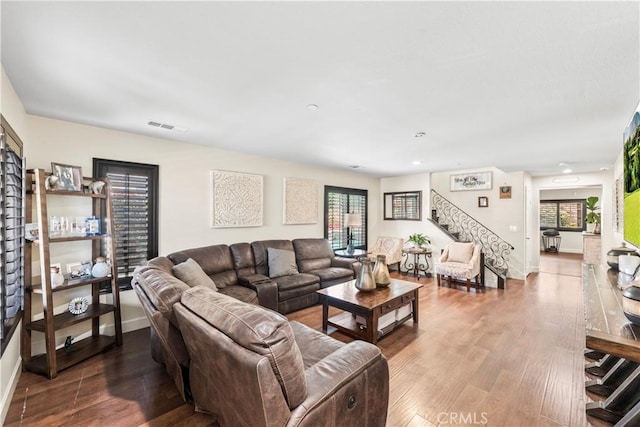 7925 Hemingway Ct, Fontana, CA 92336 - living area featuring stairs, wood finished floors, and baseboards
