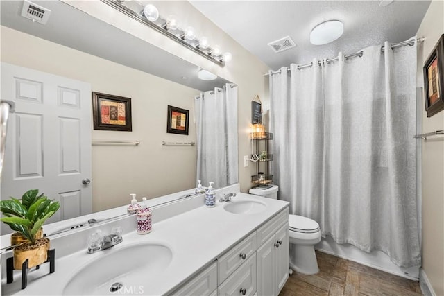 7925 Hemingway Ct, Fontana, CA 92336 - full bathroom with double vanity, toilet, and shower / bath combo with shower curtain