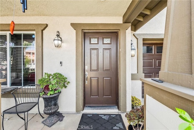 7925 Hemingway Ct, Fontana, CA 92336 - property entrance with stucco siding and covered porch