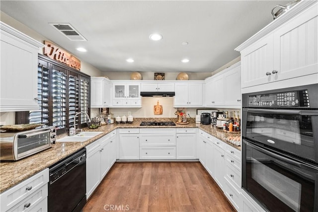 7925 Hemingway Ct, Fontana, CA 92336 - kitchen featuring black appliances, a sink, white cabinets, light wood finished floors, and under cabinet range hood