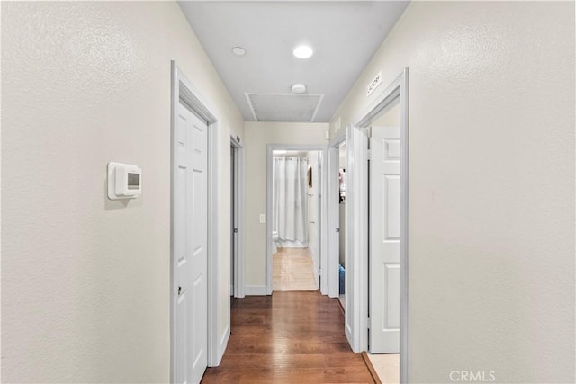7925 Hemingway Ct, Fontana, CA 92336 - hall with wood finished floors, baseboards, and recessed lighting