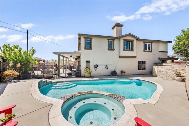 7925 Hemingway Ct, Fontana, CA 92336 - view of swimming pool with a pool with connected hot tub, a patio, and ceiling fan