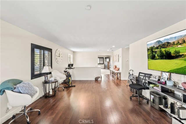 7925 Hemingway Ct, Fontana, CA 92336 - living area with wood finished floors, baseboards, and recessed lighting