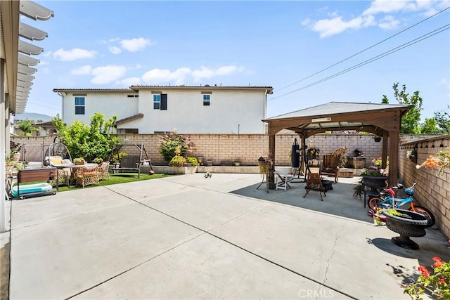 7925 Hemingway Ct, Fontana, CA 92336 - fenced backyard with a gazebo and a patio