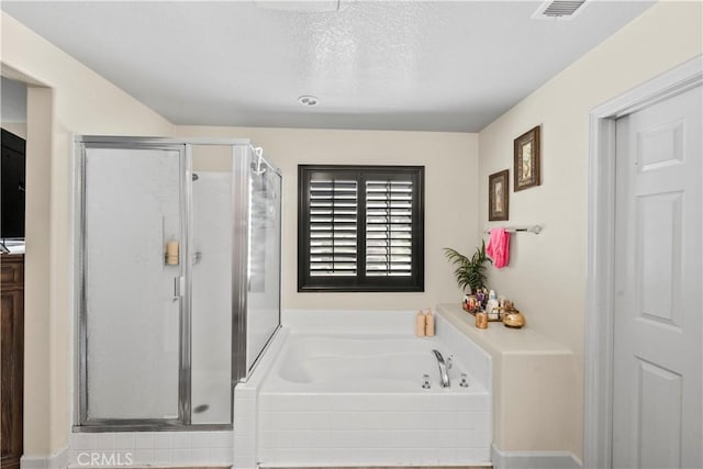 7925 Hemingway Ct, Fontana, CA 92336 - full bath featuring a garden tub, a stall shower, and a textured ceiling