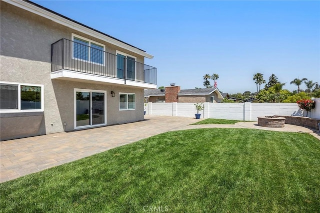 17776 Buena Vista Ave, Yorba Linda, CA 92886 - view of yard featuring a balcony, an outdoor fire pit, and a patio area
