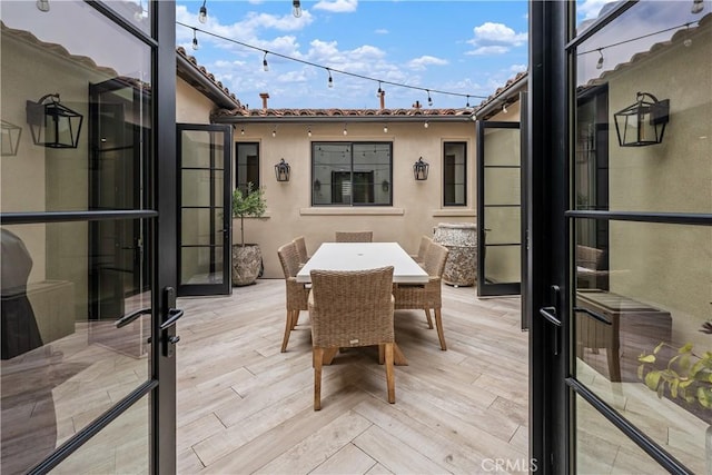 8126 Santaluz Village N, San Diego, CA 92127 - wooden terrace with outdoor dining area