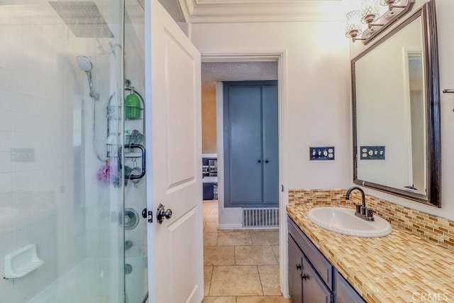 1169 Lyndhurst Dr, Riverside, CA 92507 - full bathroom featuring an enclosed shower, vanity, crown molding, and tasteful backsplash