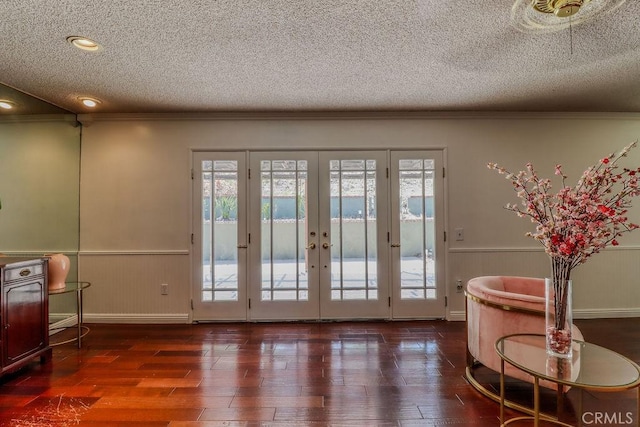 1169 Lyndhurst Dr, Riverside, CA 92507 - doorway with a textured ceiling, french doors, a wainscoted wall, crown molding, and plenty of natural light