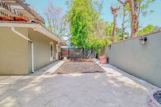 1169 Lyndhurst Dr, Riverside, CA 92507 - fenced backyard with a patio area