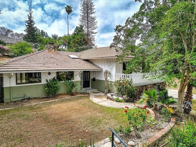 1169 Lyndhurst Dr, Riverside, CA 92507 - view of front of house with a chimney and a tiled roof