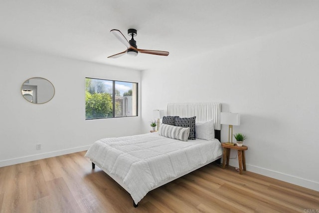 1915 Via Las Palmas Unit 32A, National City, CA 91950 - bedroom with baseboards, wood finished floors, and ceiling fan