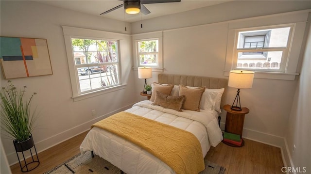 1520 Ohio Ave, Long Beach, CA 90804 - bedroom featuring baseboards, wood finished floors, and ceiling fan