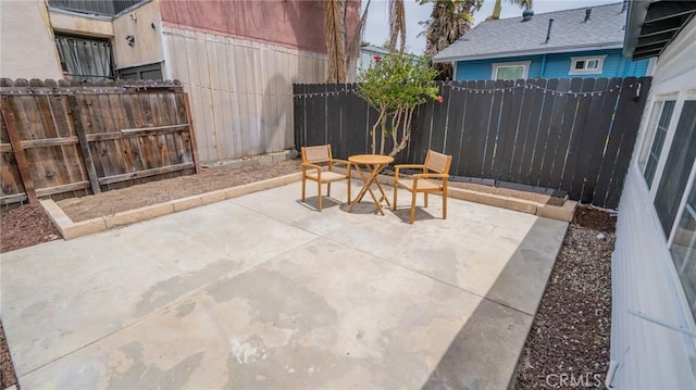 1520 Ohio Ave, Long Beach, CA 90804 - fenced backyard featuring a patio area