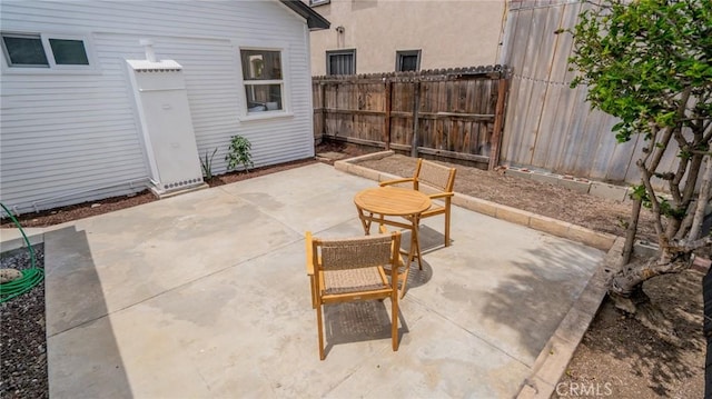 1520 Ohio Ave, Long Beach, CA 90804 - fenced backyard featuring a patio area