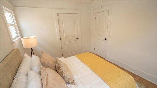 1520 Ohio Ave, Long Beach, CA 90804 - bedroom with wood finished floors and baseboards