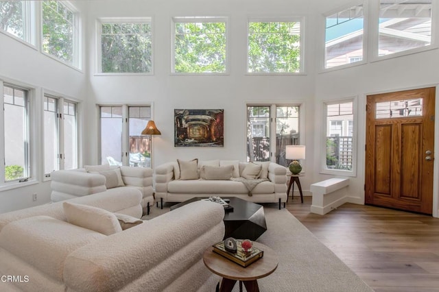 2759 Butter Creek Dr, Pasadena, CA 91107 - living room featuring a high ceiling, wood finished floors, and plenty of natural light