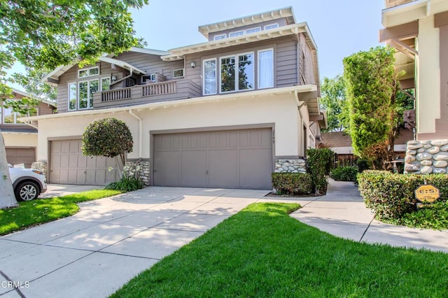 2759 Butter Creek Dr, Pasadena, CA 91107 - view of front of home with a balcony, an attached garage, stone siding, driveway, and stucco siding