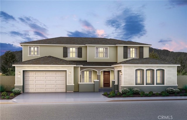 17602 Col Ranch Dr, Riverside, CA 92503 - view of front of home featuring driveway, a garage, and stucco siding